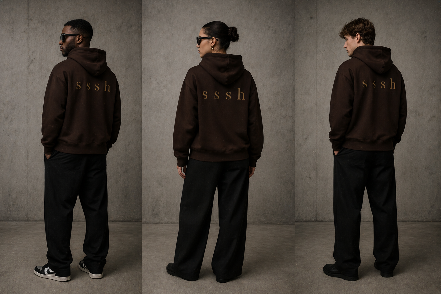 Three people wearing dark brown hoodies with 'SSSH' logo against a gray background